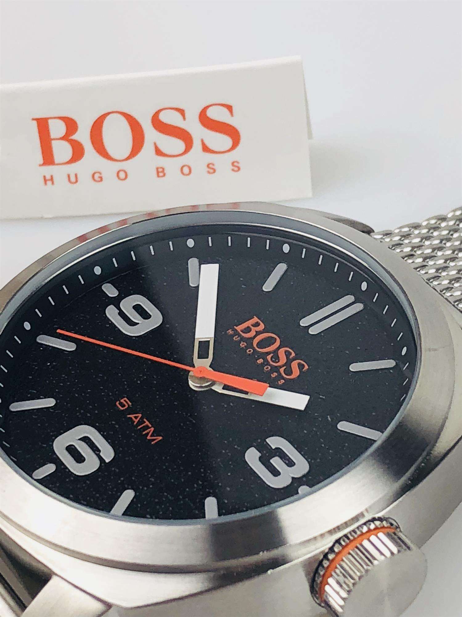 The Watch: Hugo Boss Orange Cape Town Stainless Steel Mesh Strap Stainless Steel Case Men’s Watch 1550013In a homage to the mountainous city from which it takes its name, this Hugo Boss Orange Cape Town Stainless Steel Men’s Watch (1550013) features a confident stainless steel mesh bracelet and case, with a sleek and contemporary dial design ensuring this sense of adventure is underpinned by the Hugo Boss design ethos.&nbsp;Key Features:Quartz MovementBlack DialStainless Steel Mesh BraceletWater Resistant t
