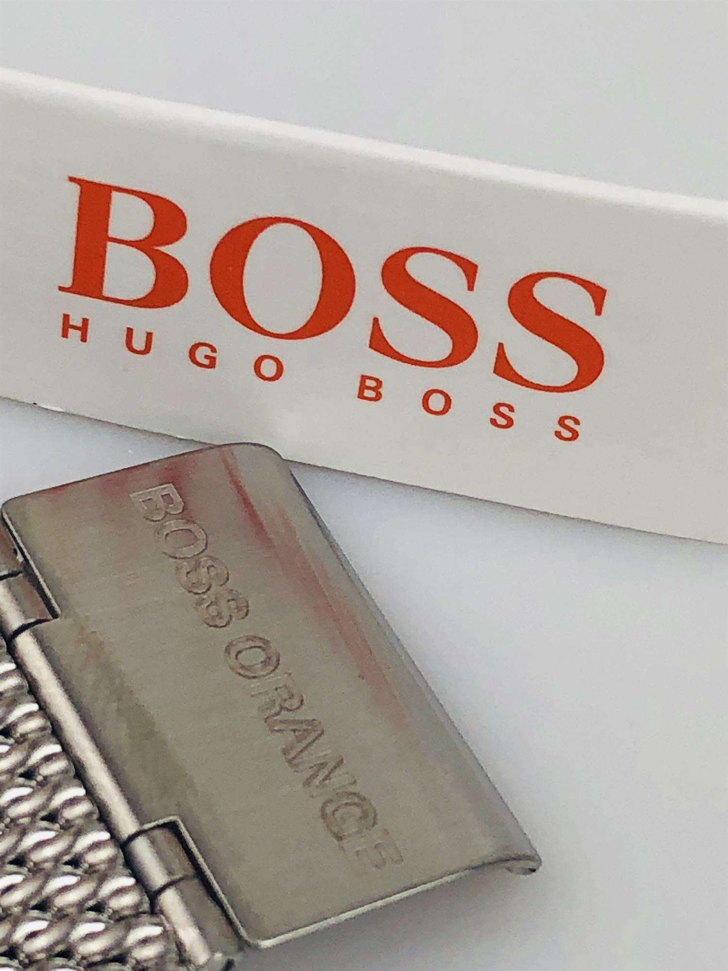 The Watch: Hugo Boss Orange Cape Town Stainless Steel Mesh Strap Stainless Steel Case Men’s Watch 1550013In a homage to the mountainous city from which it takes its name, this Hugo Boss Orange Cape Town Stainless Steel Men’s Watch (1550013) features a confident stainless steel mesh bracelet and case, with a sleek and contemporary dial design ensuring this sense of adventure is underpinned by the Hugo Boss design ethos.&nbsp;Key Features:Quartz MovementBlack DialStainless Steel Mesh BraceletWater Resistant t