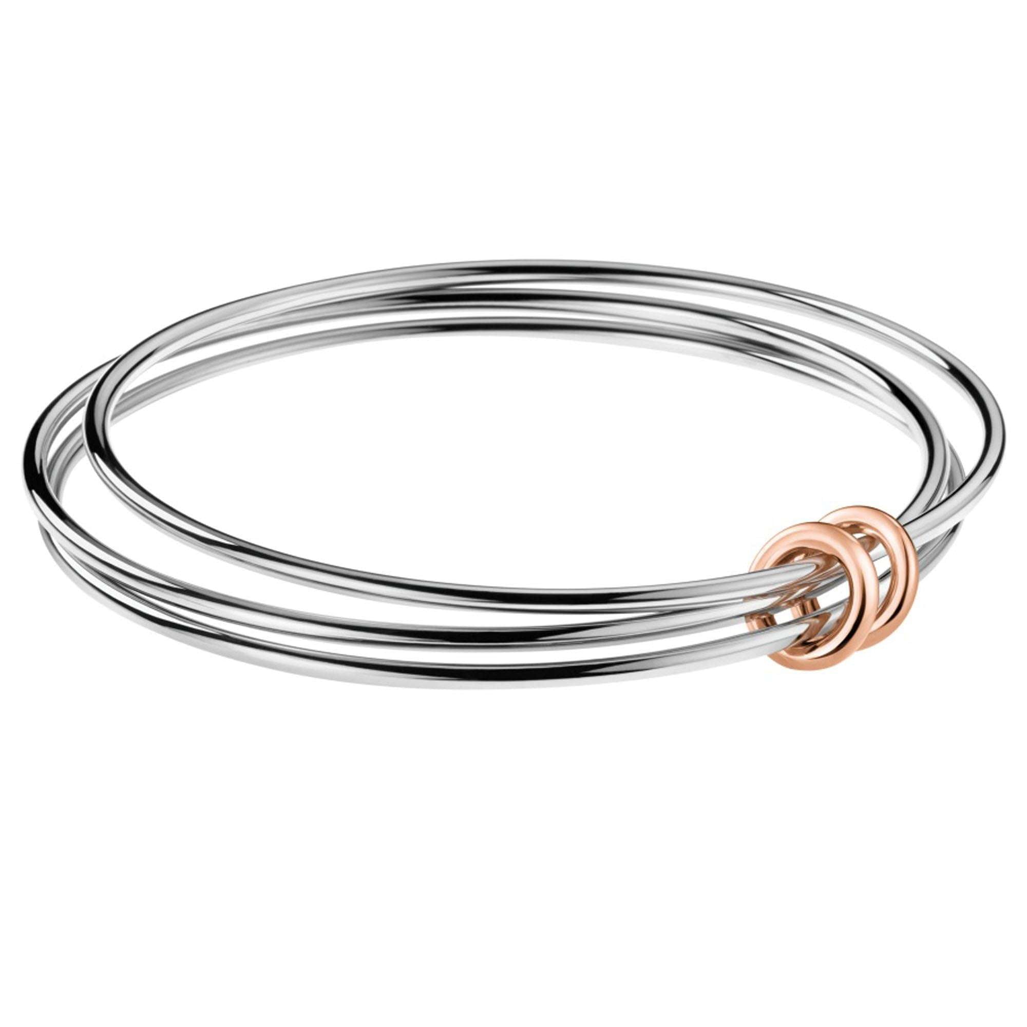 Calvin Klein Two Tone Stainless Steel Ladies Bangle KJ5HMD20010SThis Swiss-made Calvin Klein Bangle is fashioned for the ladies. It is built to the highest quality with three combined bangles joined via two rose gold plated rings.&nbsp; The bangle&nbsp;is a bold piece, perfect for any occasion.Key Features:Size SmallNimble CollectionThree Combined BanglesThe Brand: Calvin KleinCalvin Klein is one of the truly iconic cultural forces to emerge from the twentieth century. Based on bold, progressive thinking an