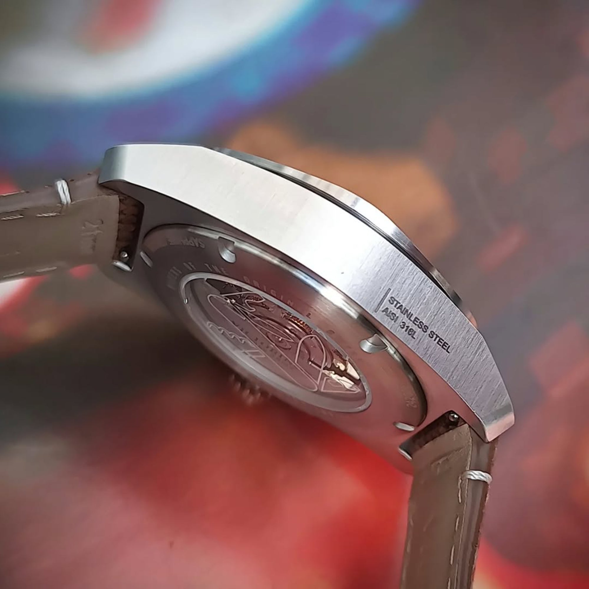 A side-profile view of a stainless steel Victorinox I.N.O.X. 242018.1
