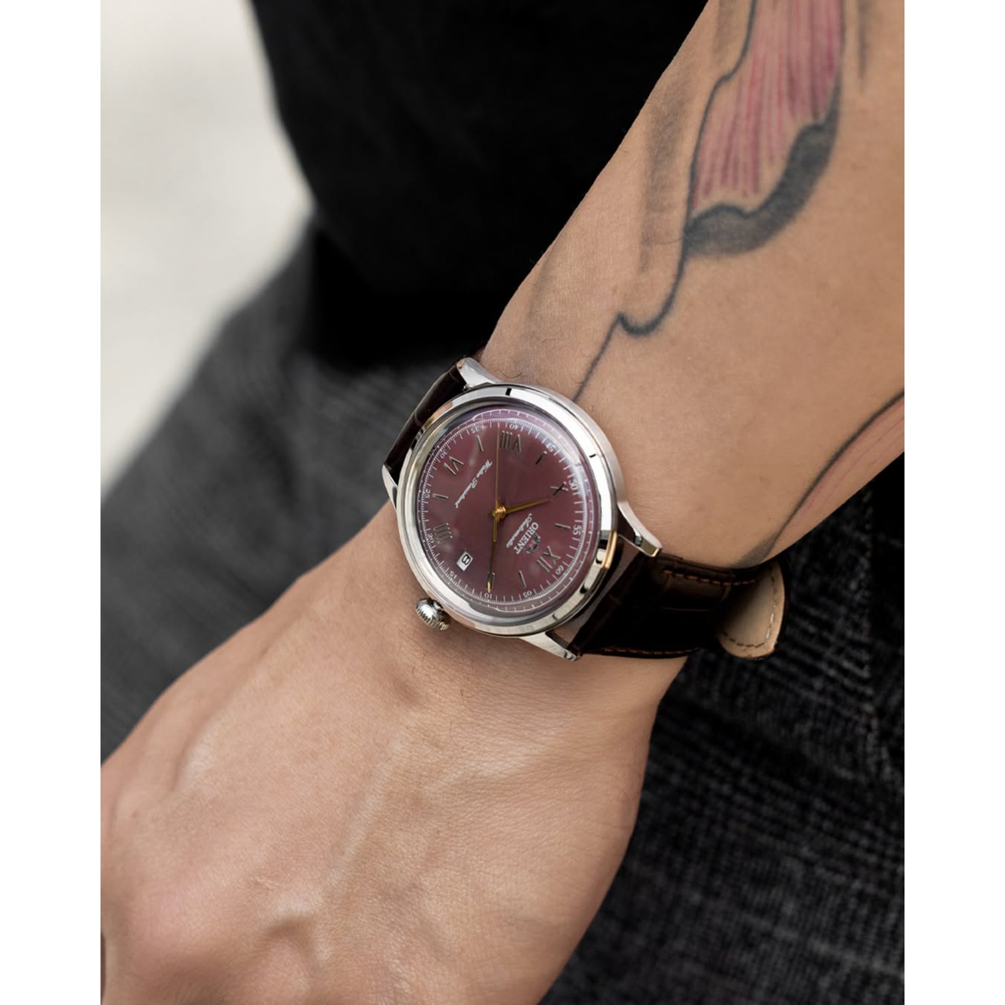 Orient Bambino RA-AC0026R30B automatic dress watch worn on wrist