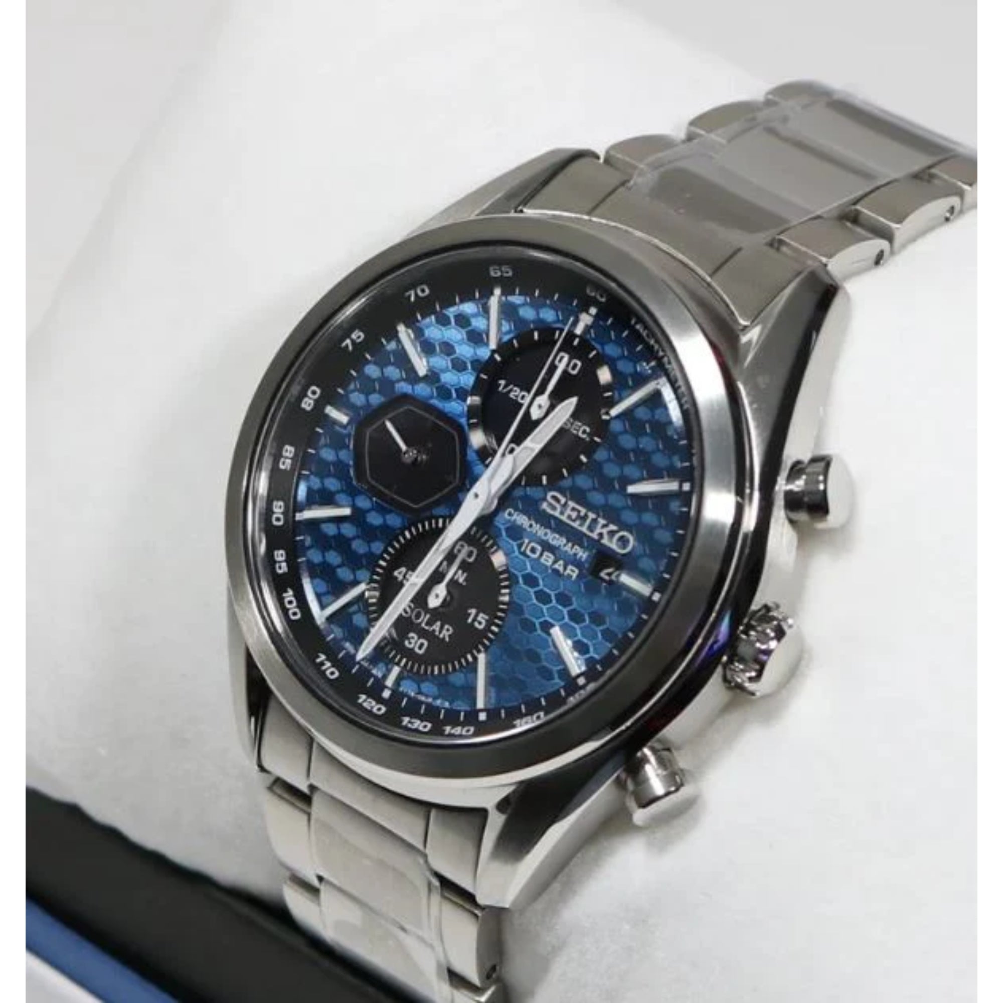 Seiko Essentials Solar Chronograph watch SKU SSC801P1 with a blue dial and stainless steel bracelet