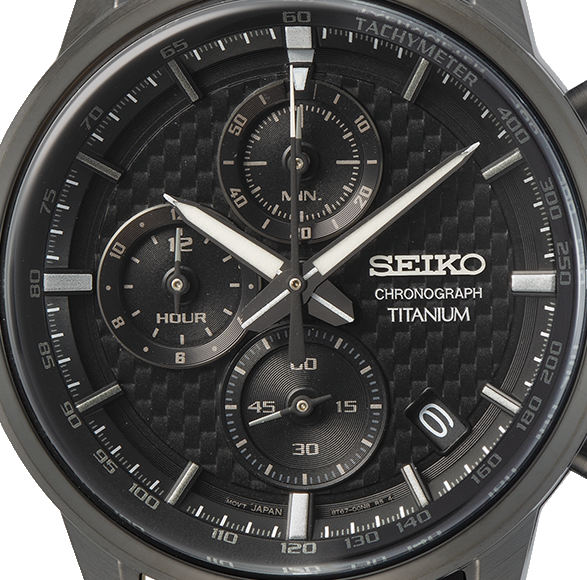 Seiko chronograph titanium watch with black face and carbon fiber pattern