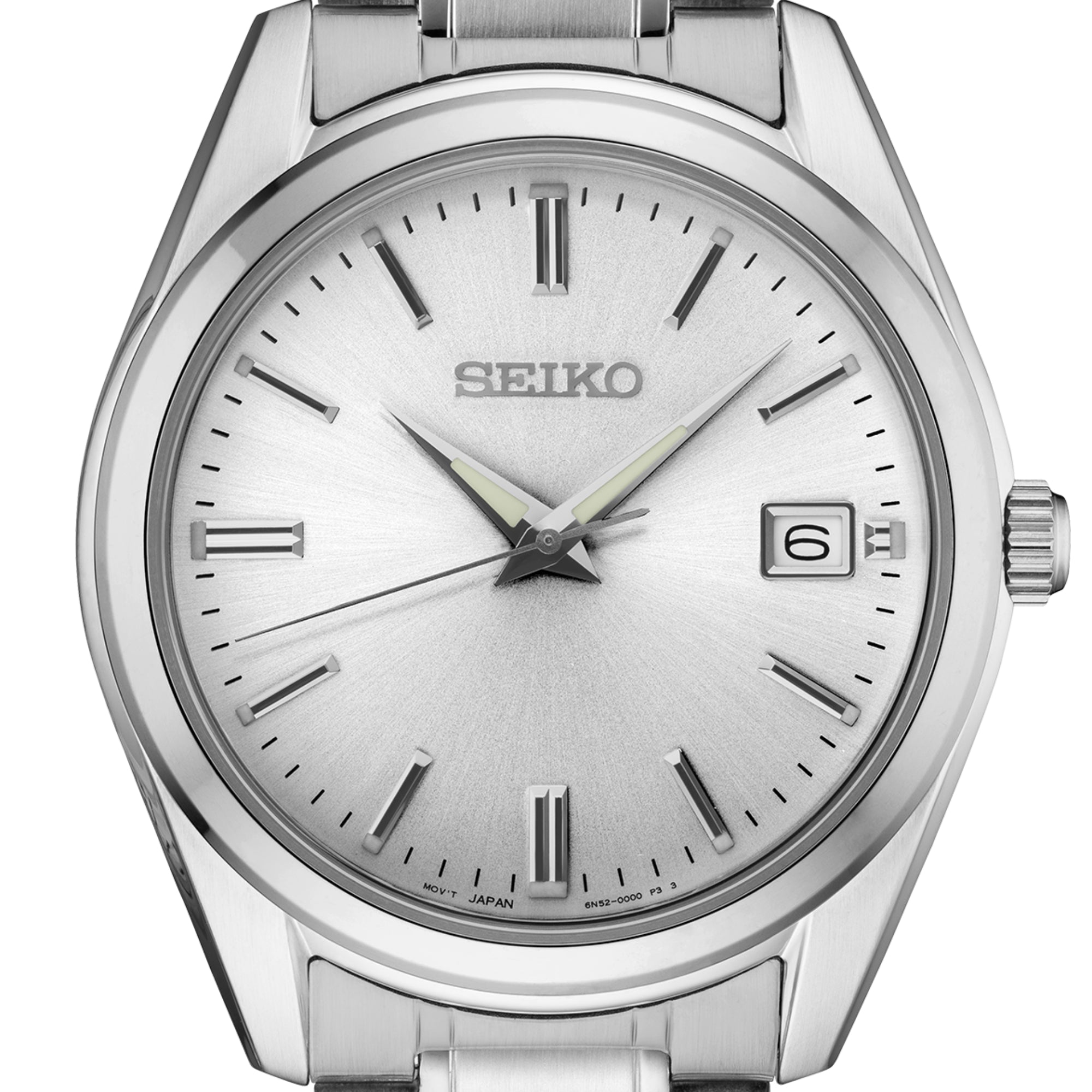 Close-up of Seiko SUR307P1 silver sunburst dial with date window and baton markers