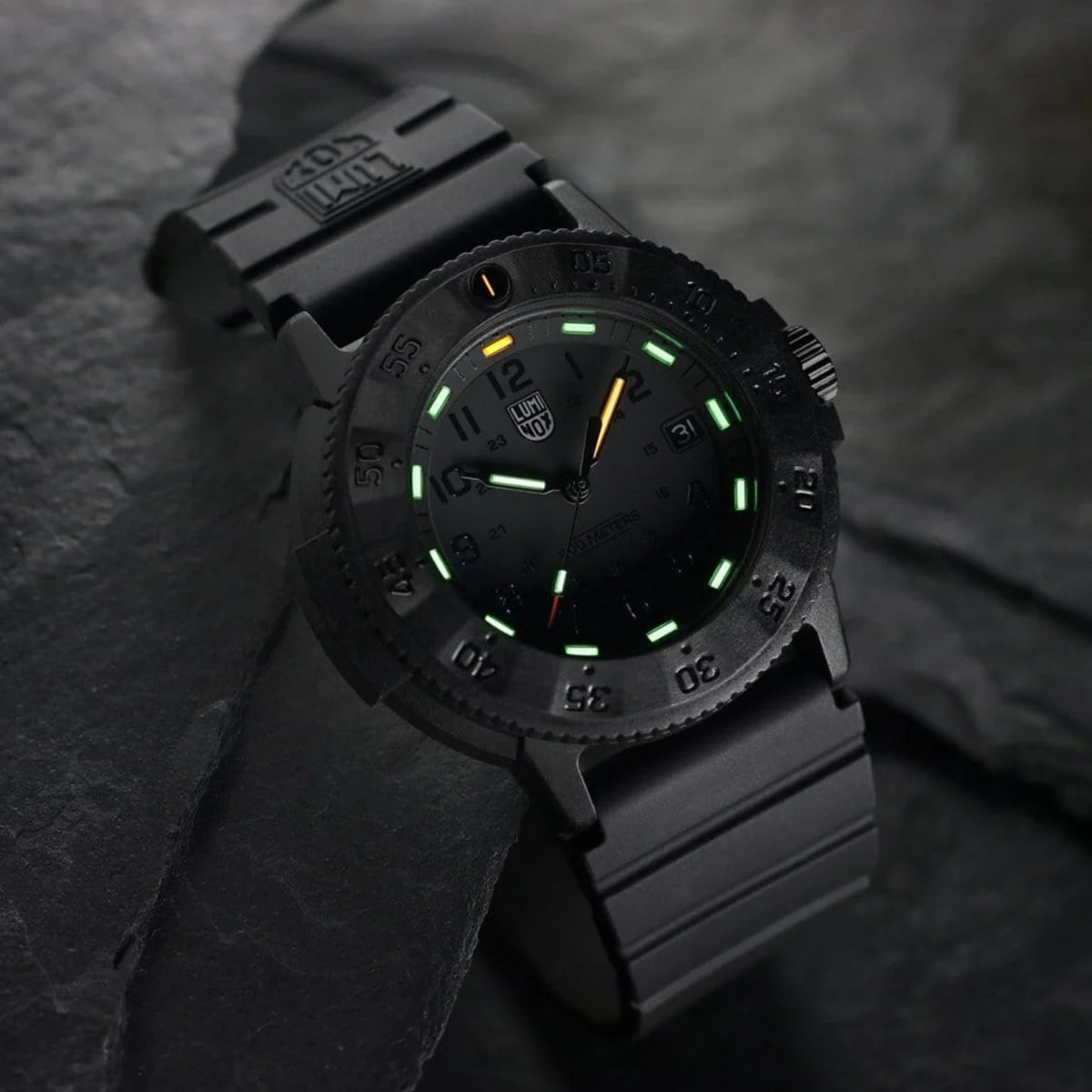 Luminox men's quartz dive watch with black rubber strap, black dial, green luminous markers