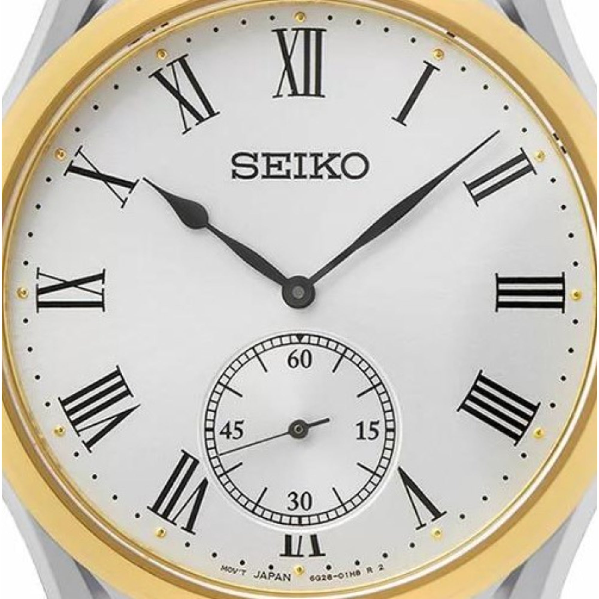 Seiko Essentials white dial two-tone slim dress watch close-up
