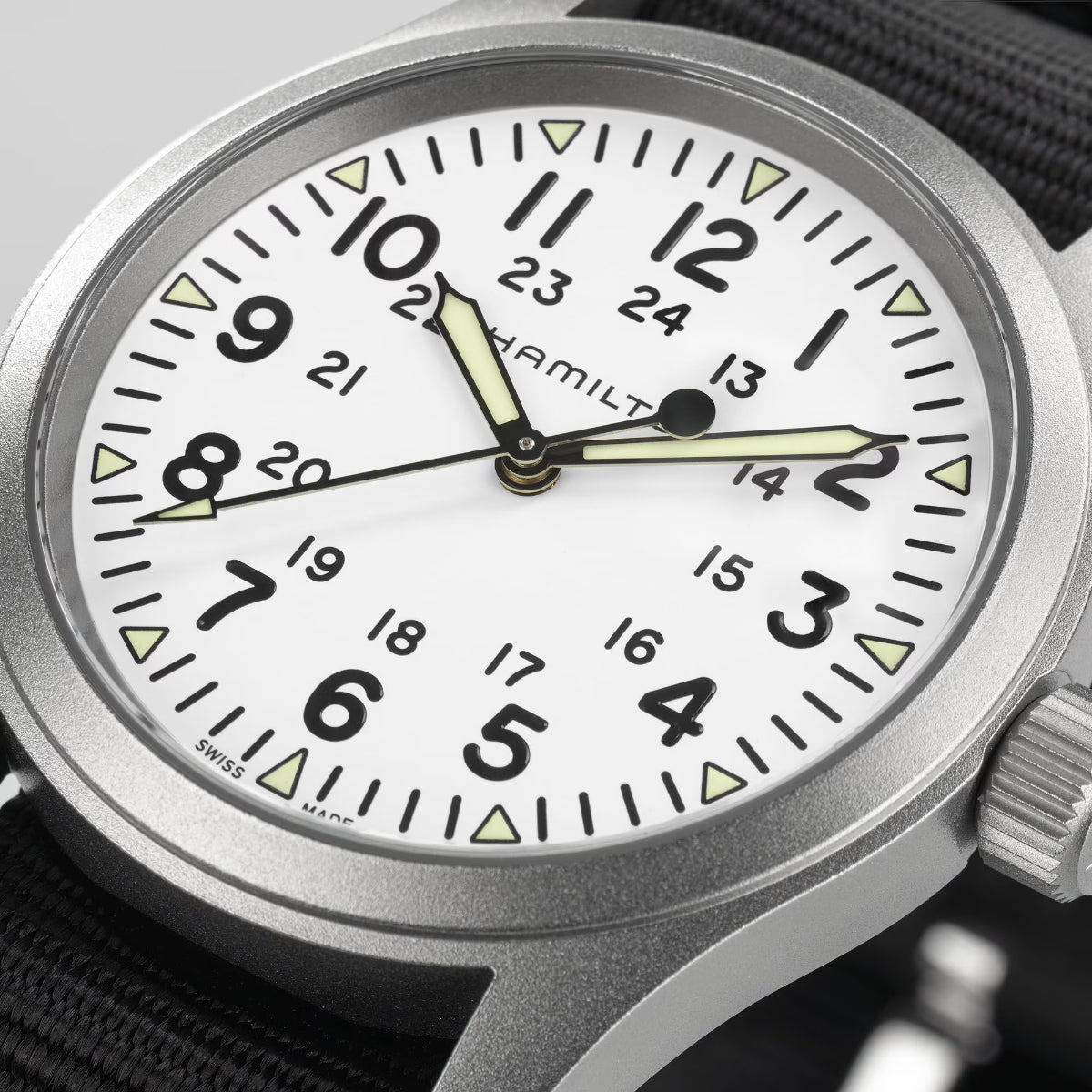 Hamilton Khaki Field H69439910 white dial with black Arabic numerals and 24-hour scale close-up