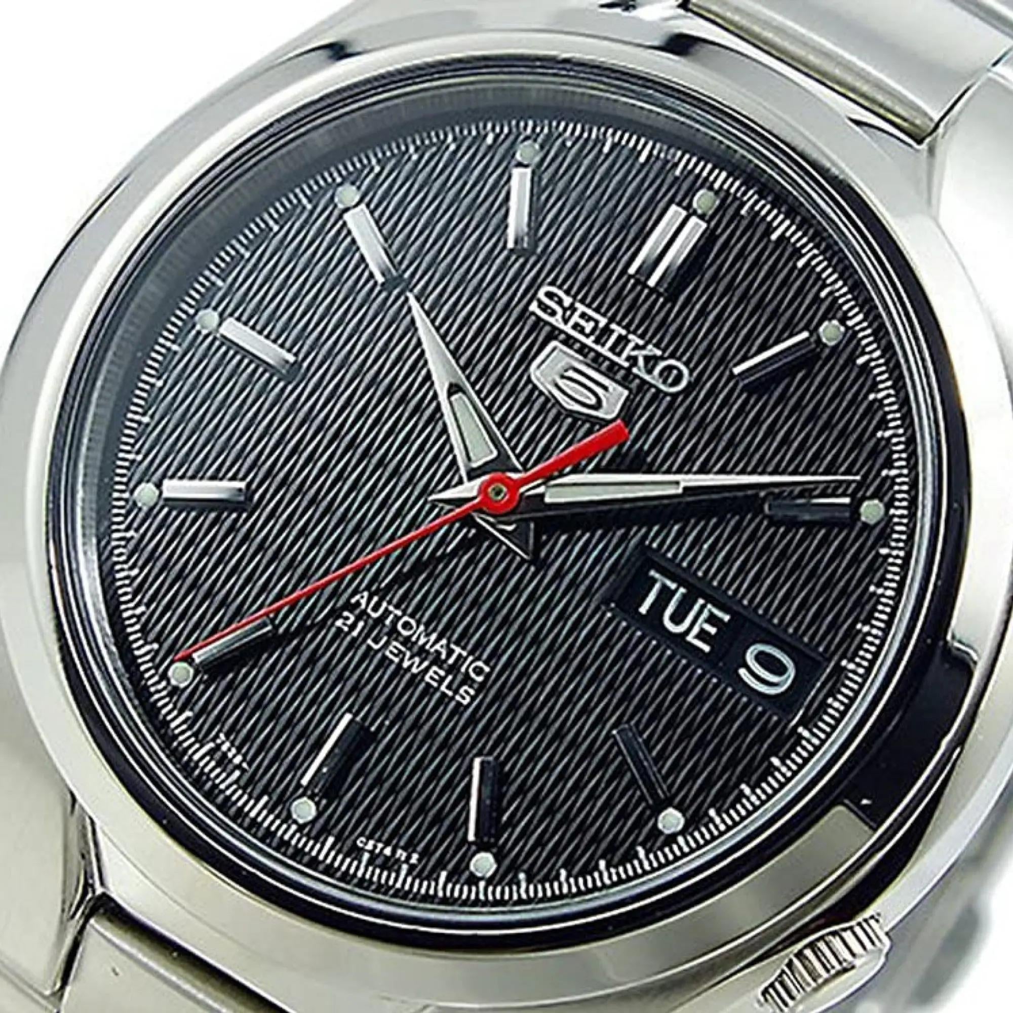 Seiko 5 automatic black dial stainless steel watch close-up