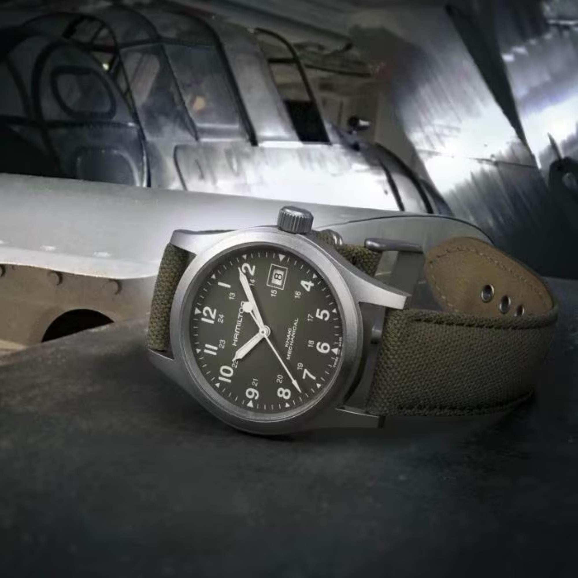 Hamilton Khaki Field 38mm Mechanical watch with a green dial and green canvas strap.