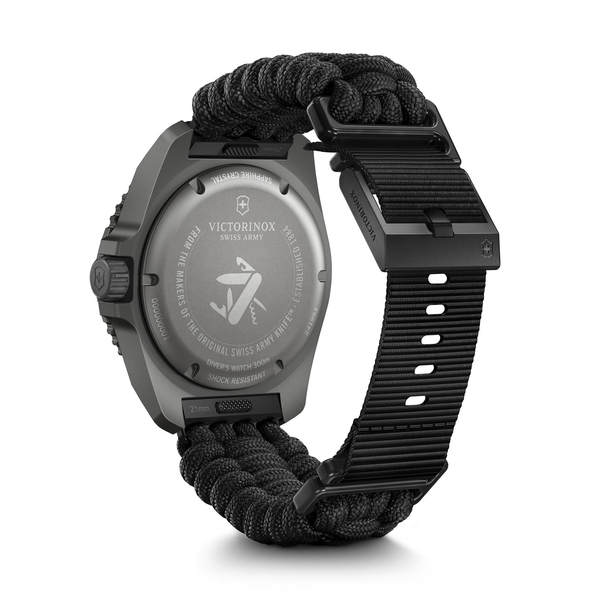 The caseback view of a dark grey Victorinox Dive Pro, featuring a black paracord strap