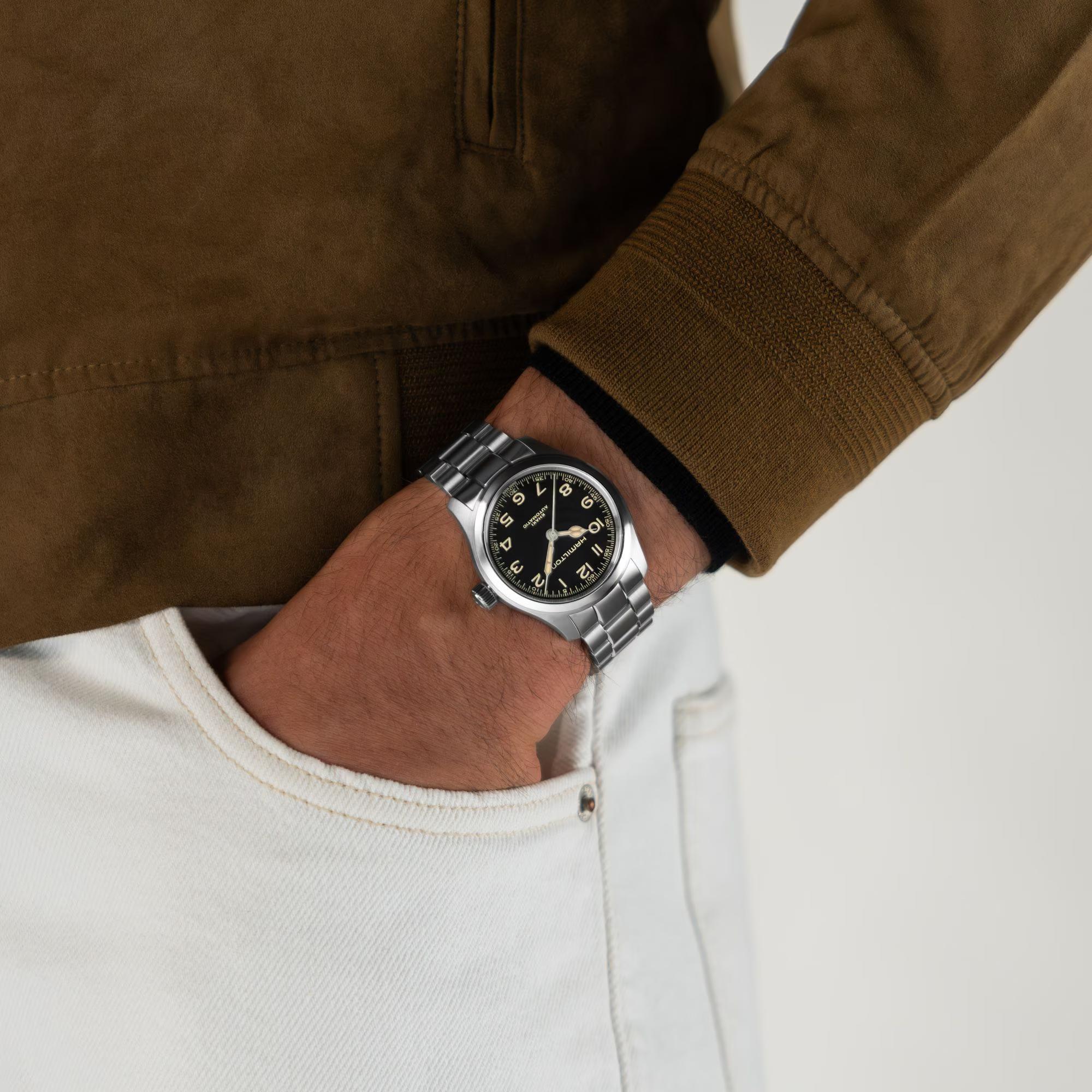 Hamilton Khaki Field murph black dial steel watch worn on wrist H70405130