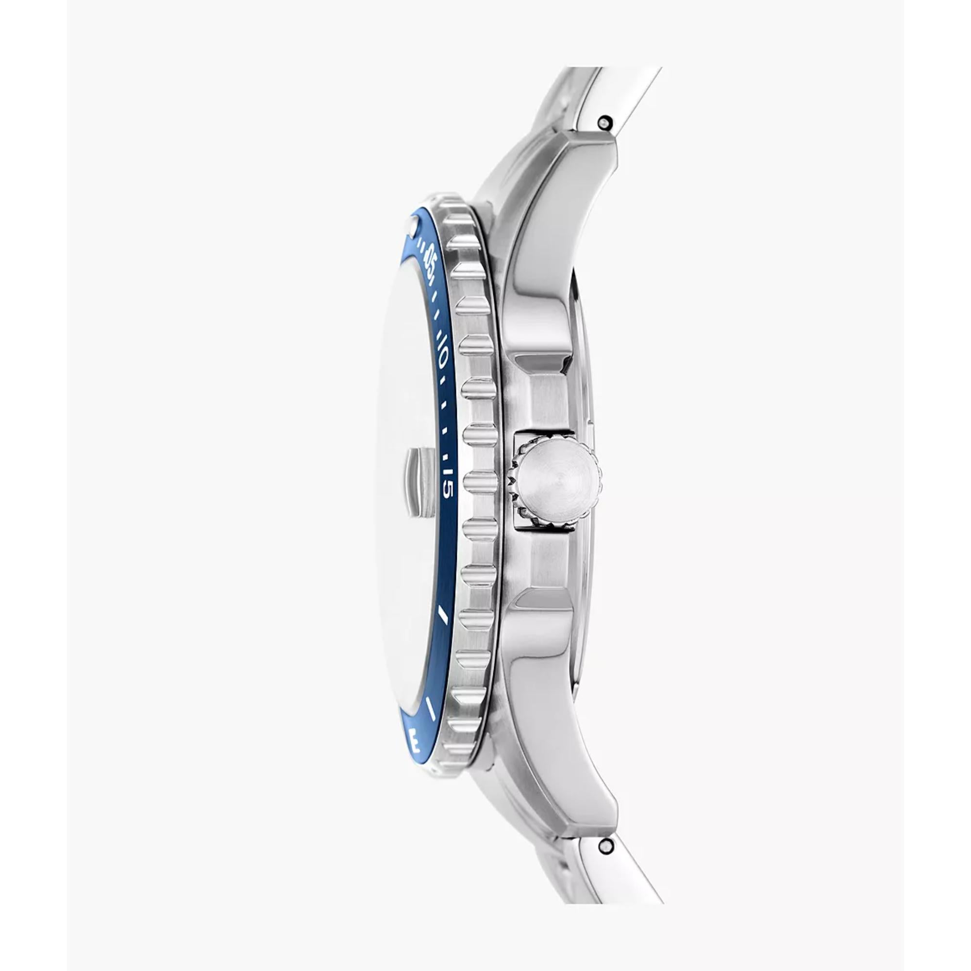 Close-up of a silver watch with blue accents on a white background