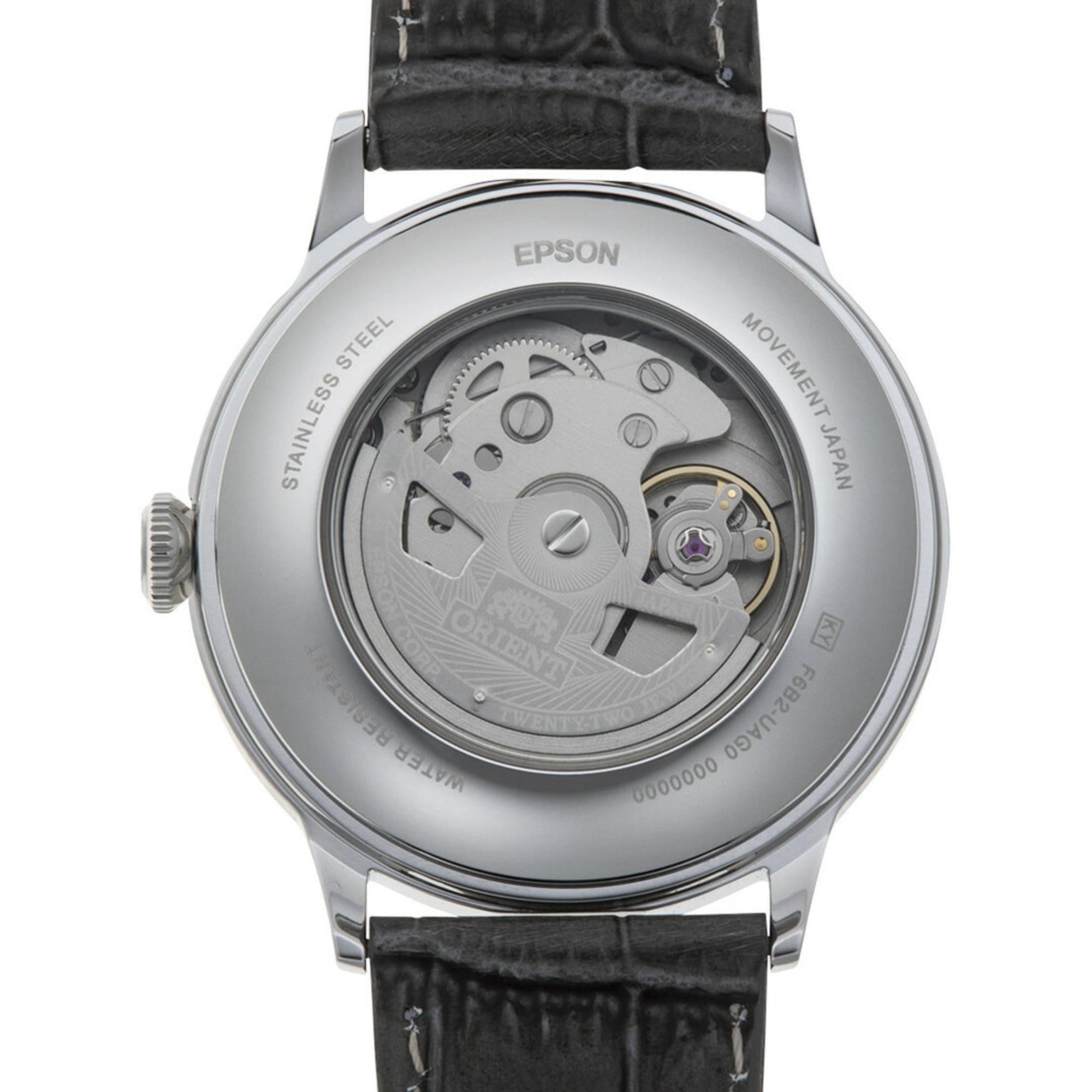 Exhibition caseback view showing the automatic movement inside an Orient Bambino watch.