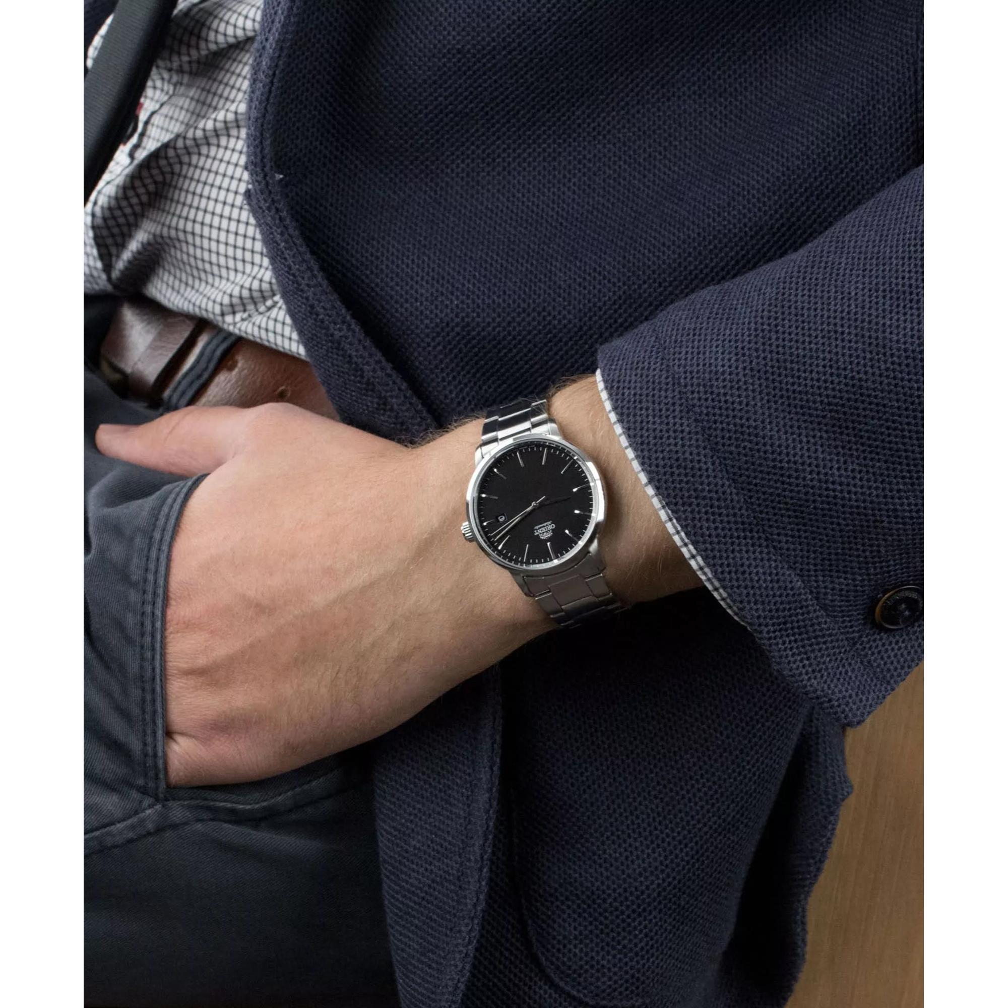 Orient Contemporary RA-AC0E01B30B black dial automatic watch on wrist 