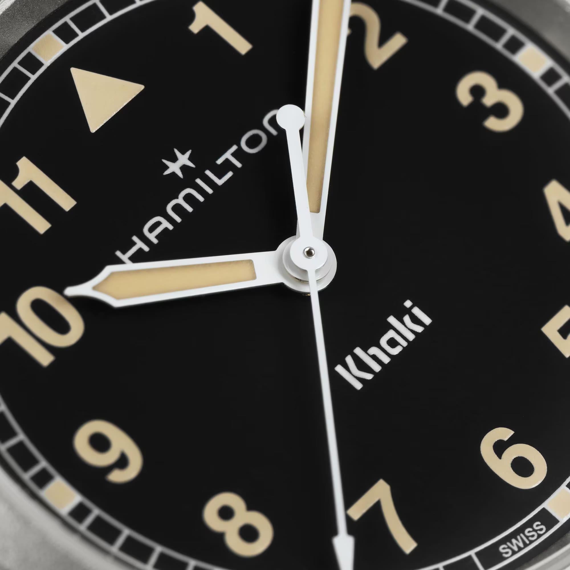 Hamilton Khaki Field H69301131 black dial with Arabic numerals and luminous hands close-up