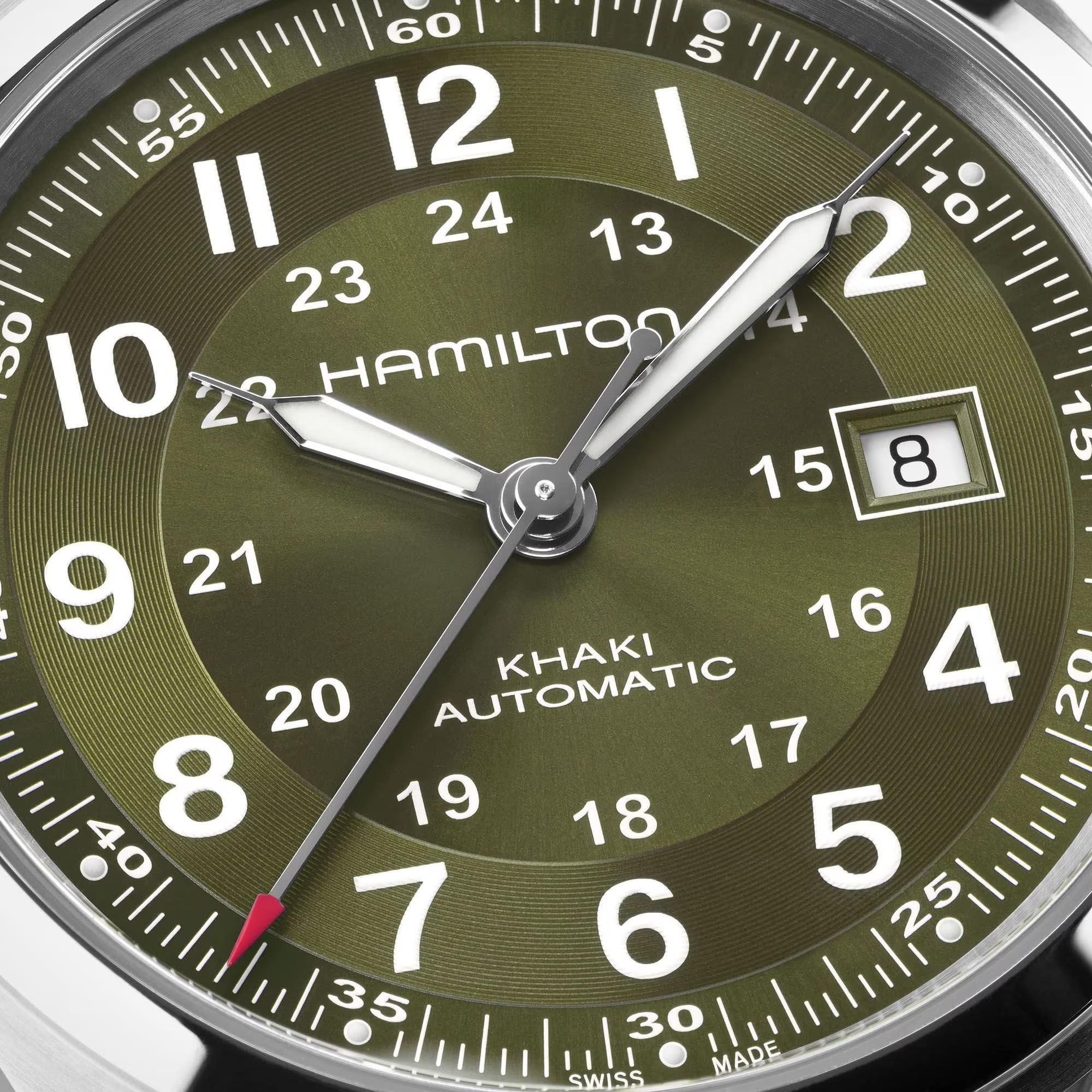 Hamilton Khaki Field H70605160 green sunray dial with Arabic numerals and date display close-up