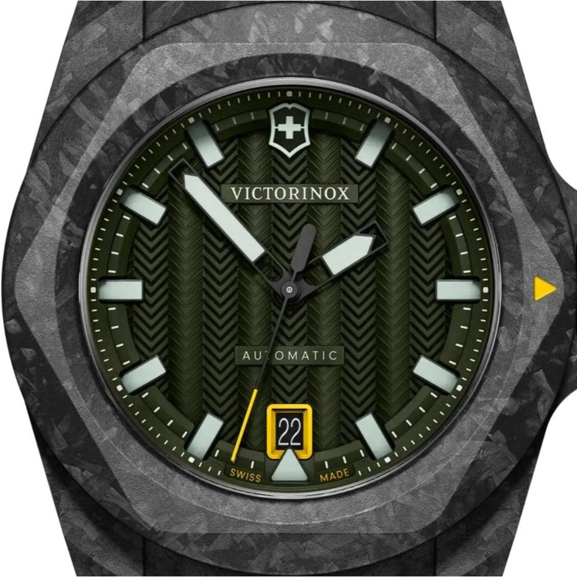 Close-up of a Victorinox automatic watch featuring a textured olive green dial and a marbled dark grey carbon bezel