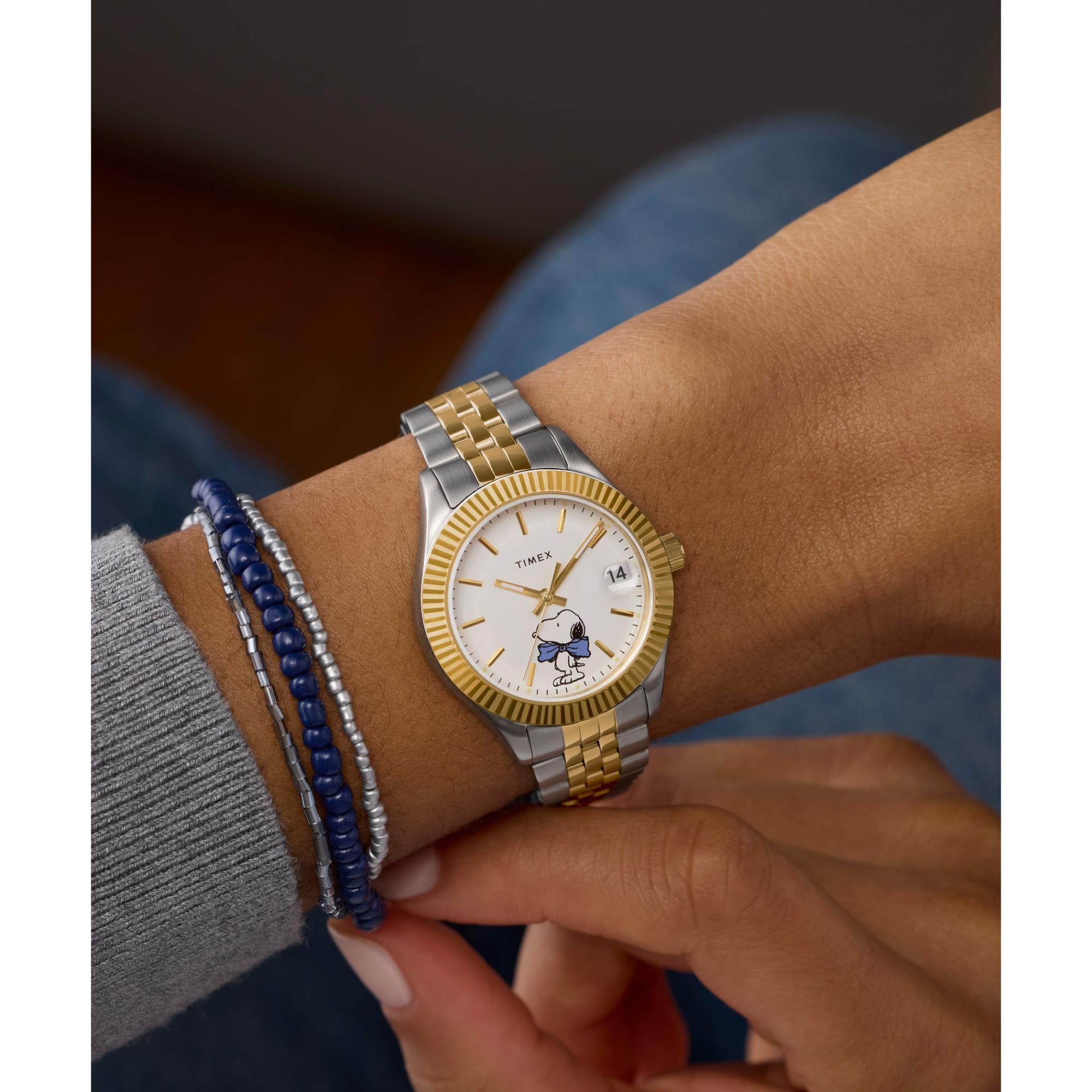 Timex Peanuts TW2Y11100 two-tone stainless steel watch on wrist