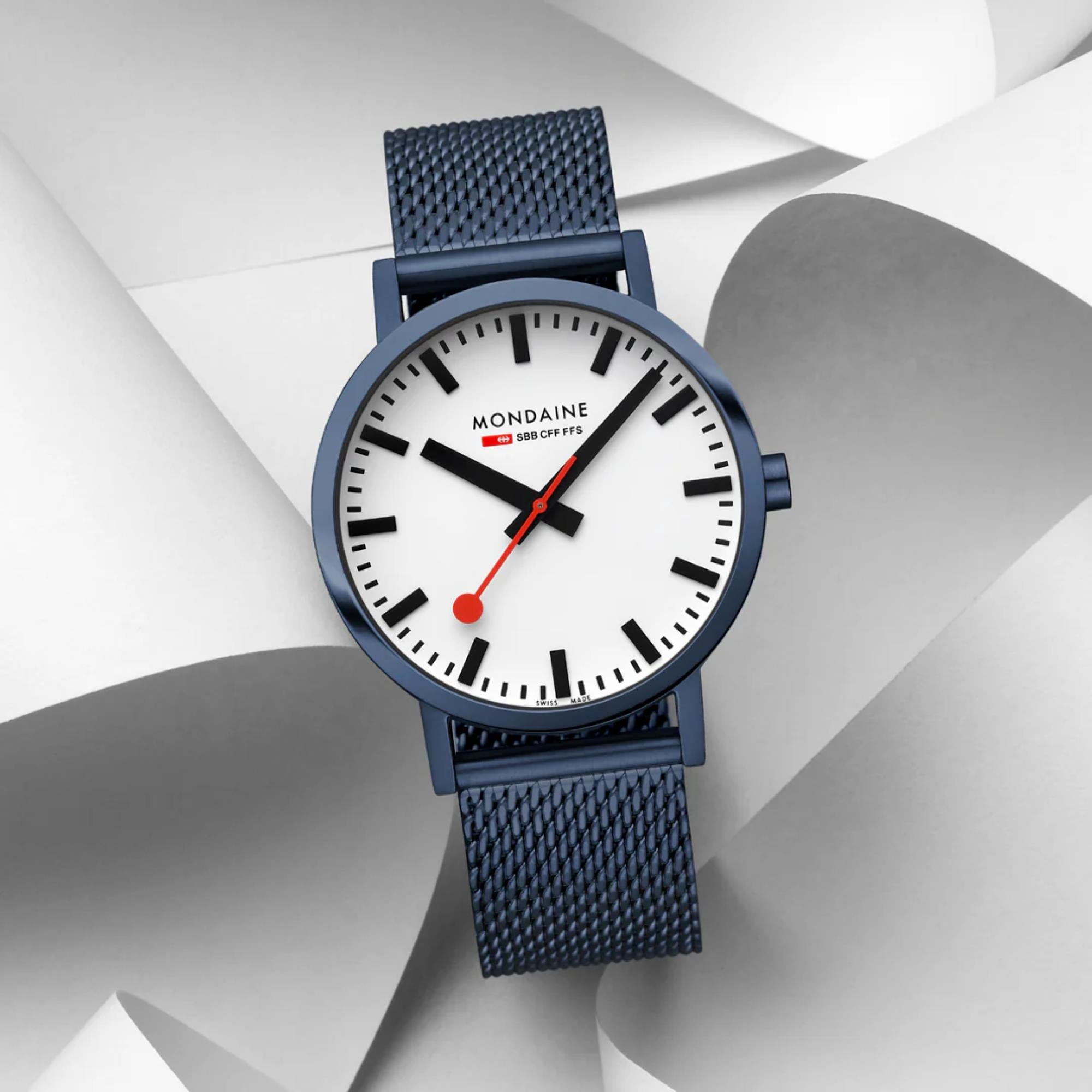 Mondaine Classic A660.30360.1BSBM watch on a stylized white paper background view