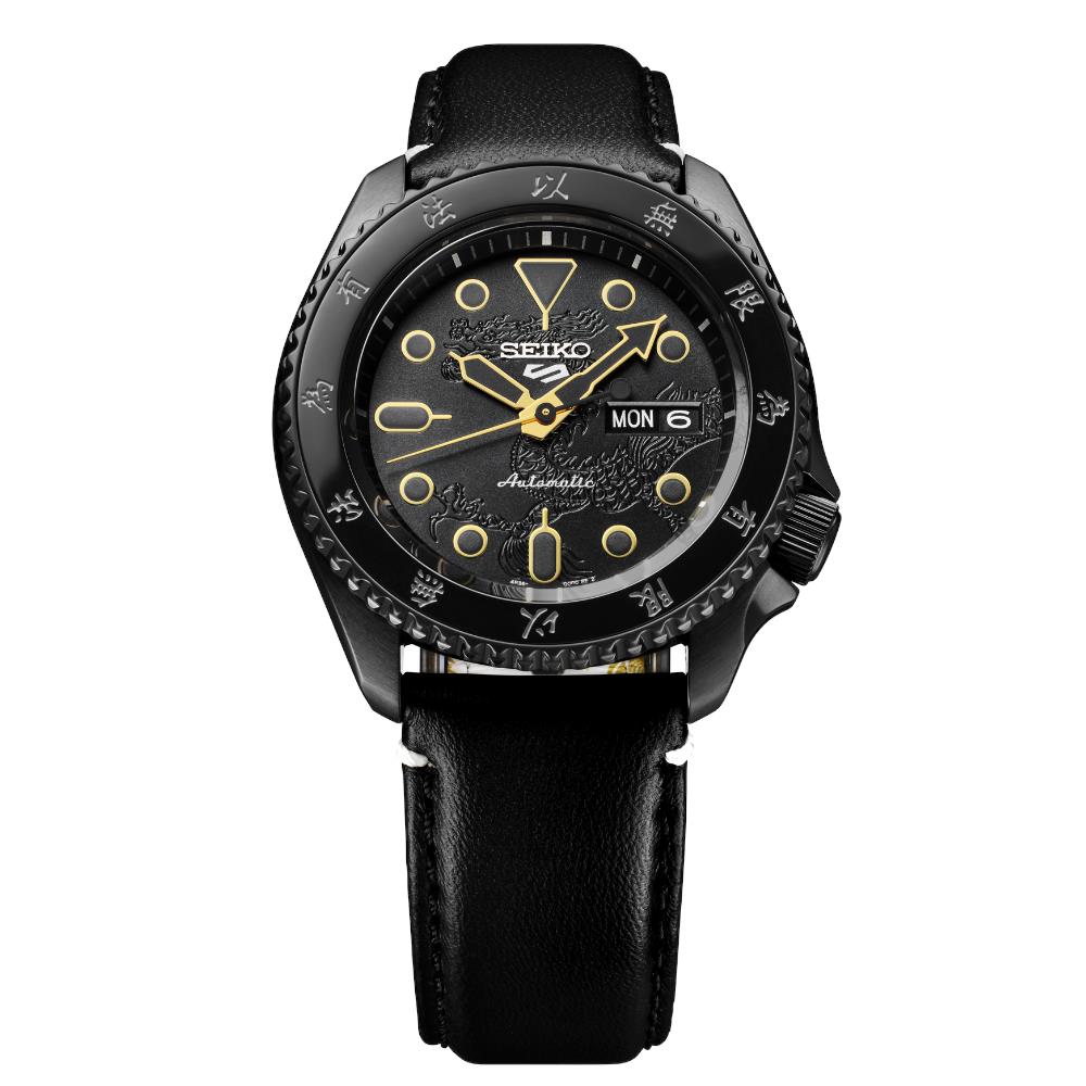 Black Seiko watch with a detailed face on a white background