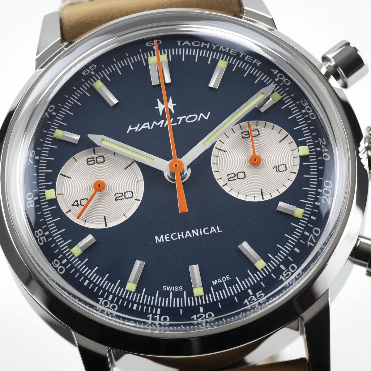 Hamilton H38429541 blue dial with orange chronograph hands and tachymeter scale close-up