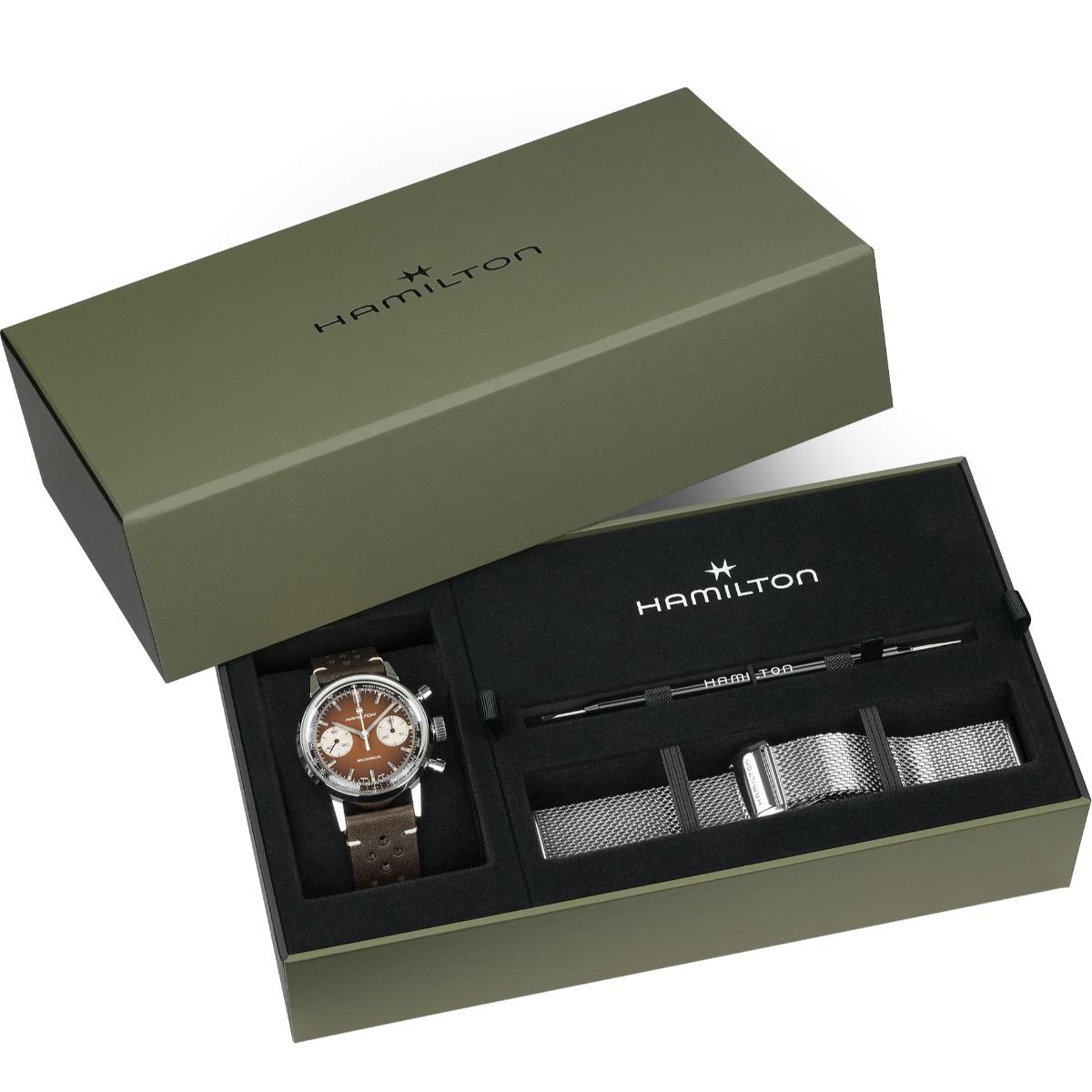 Green Hamilton watch box containing a green chronograph watch, an extra mesh strap