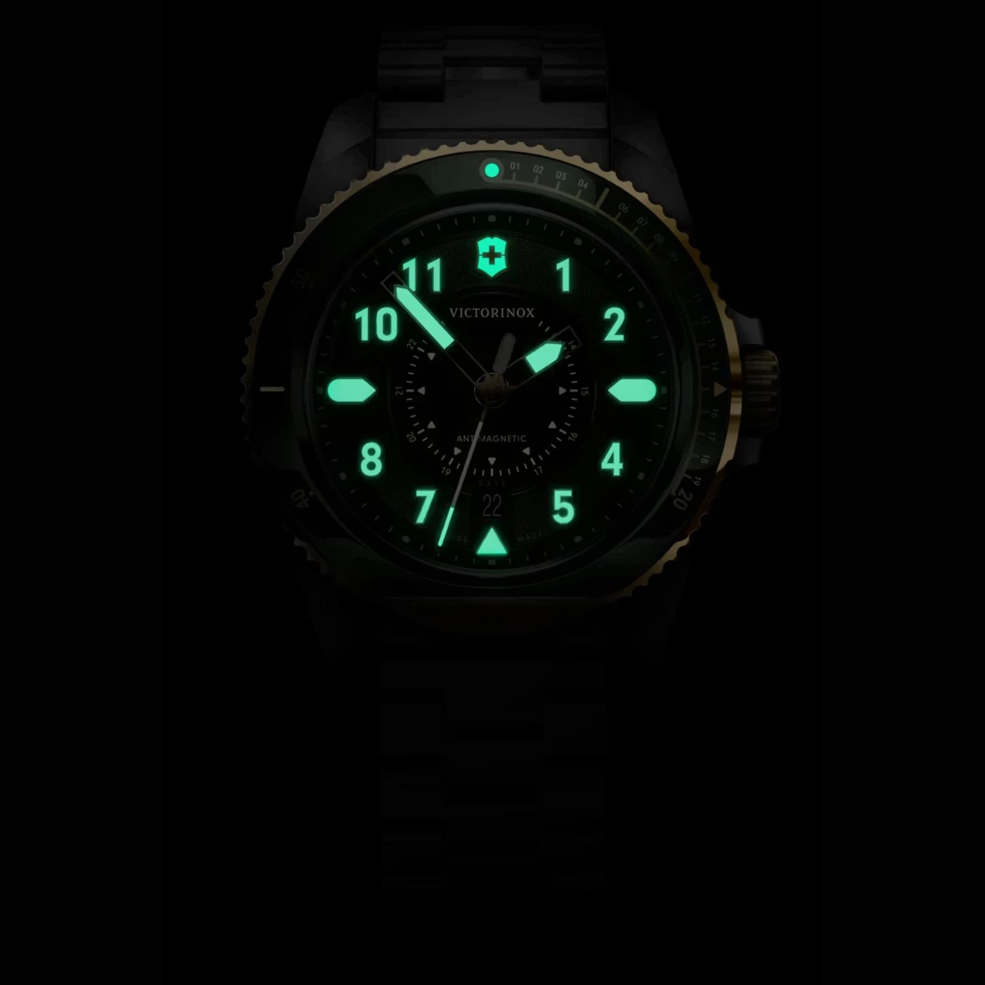 Victorinox Journey 1884 242012 green dial with luminous hands and markers at dark