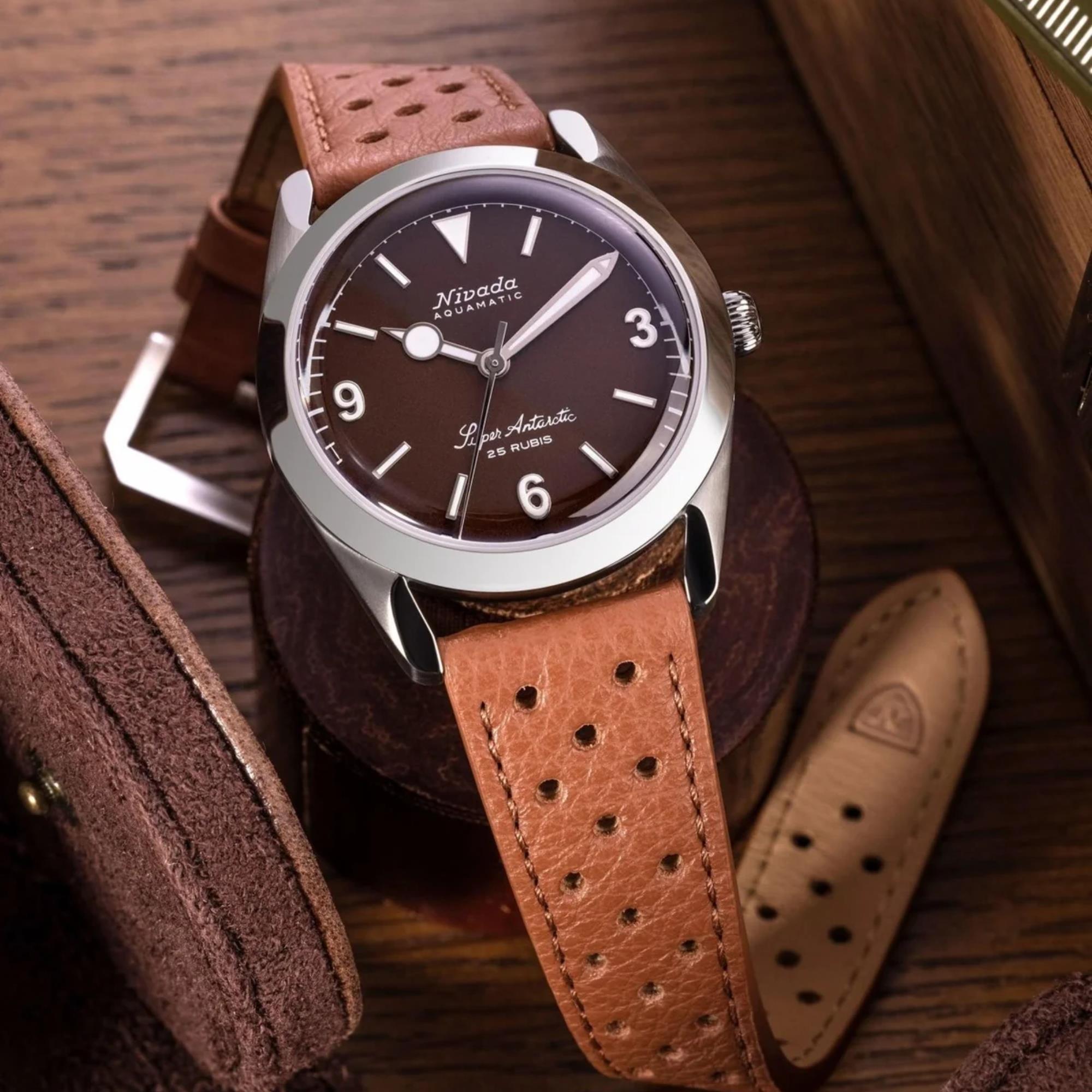 Nivada Grenchen Super Antarctic 32040A23 brown perforated leather strap and case detail