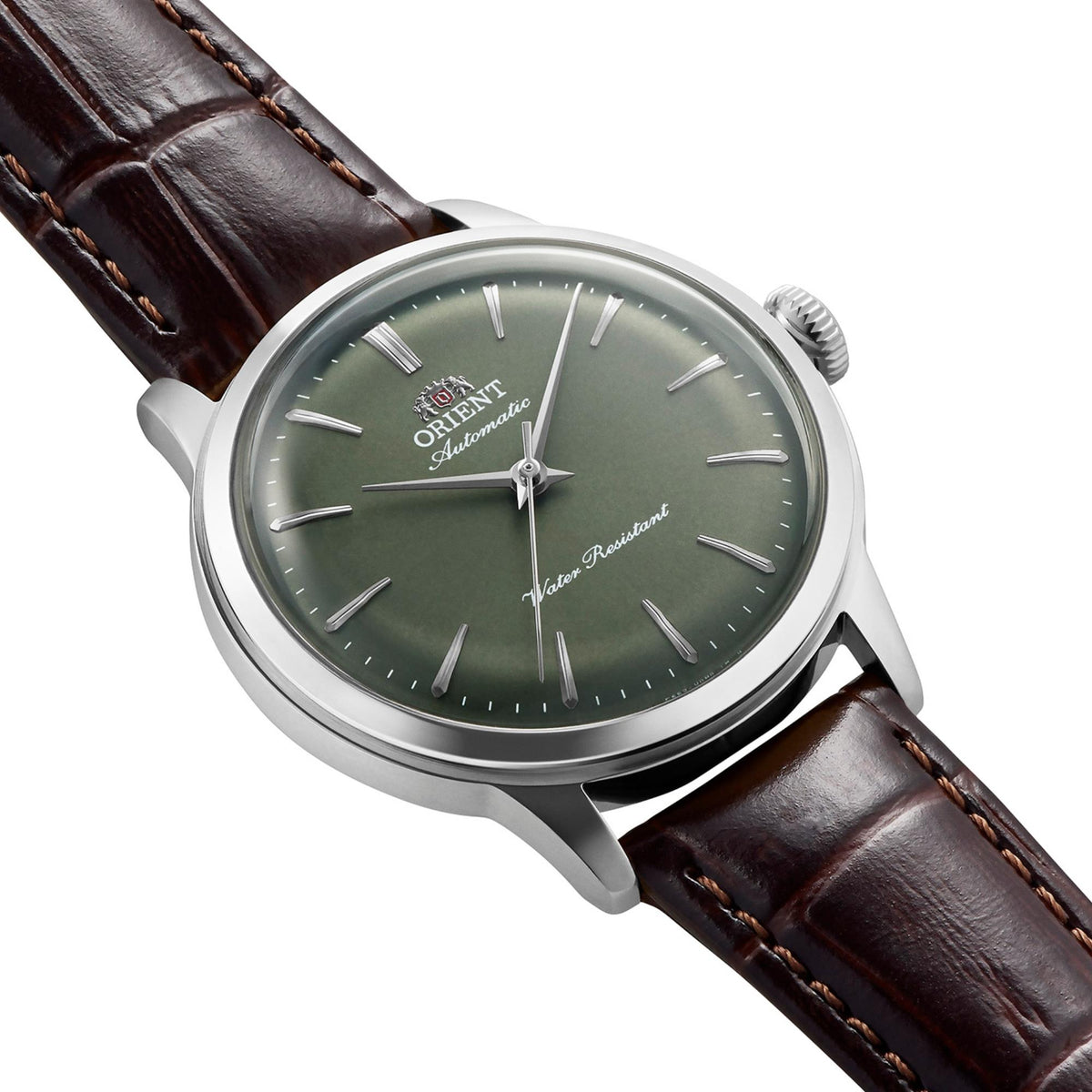 Angled veiw of Orient Bambino RA-BB0102E30B case profile at 36mm with silver-tone case with brown leather strap