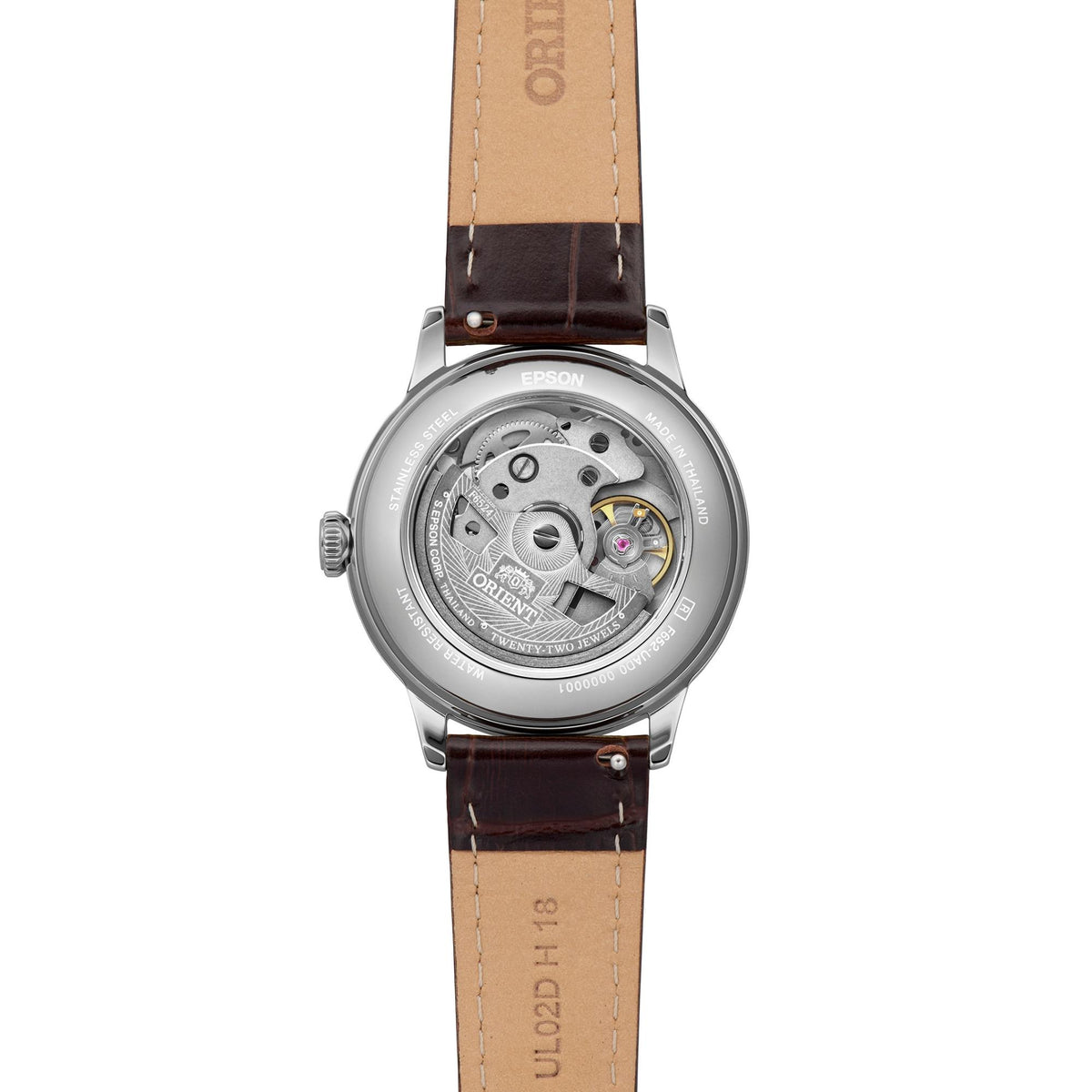 Orient Bambino RA-BB0102E30B showcasing its exhibition caseback, revealing its automatic movement and brown leather strap inner lining