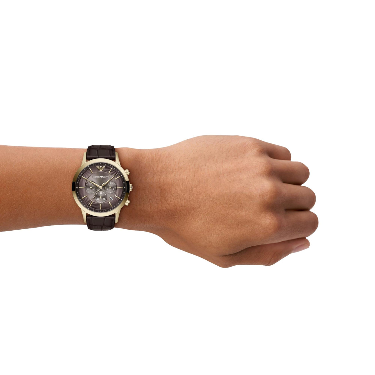 Emporio Armani Archetipo AR11822 timepiece worn on a wrist, showing the brown dial, gold-tone casing, and alligator-embossed brown leather strap