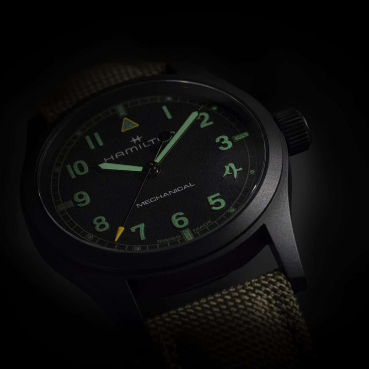 Hamilton Khaki Field Call of Duty H69469930 low-light view showing luminous dial numerals and hands