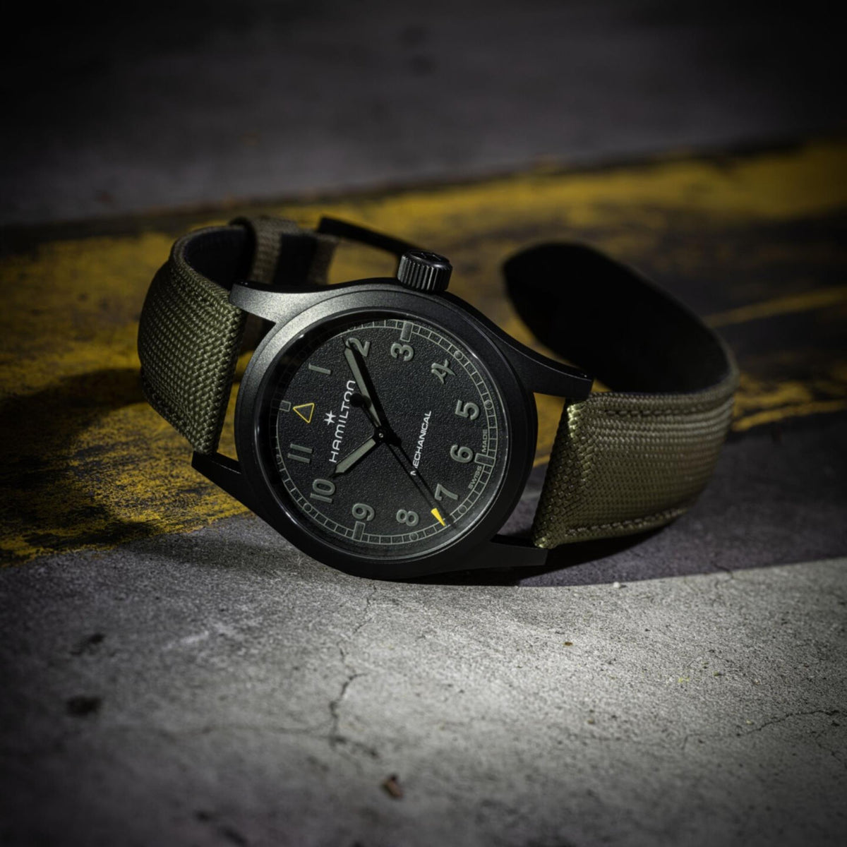 Hamilton Khaki Field Call of Duty H69469930 dramatic perspective view of black dial manual watch