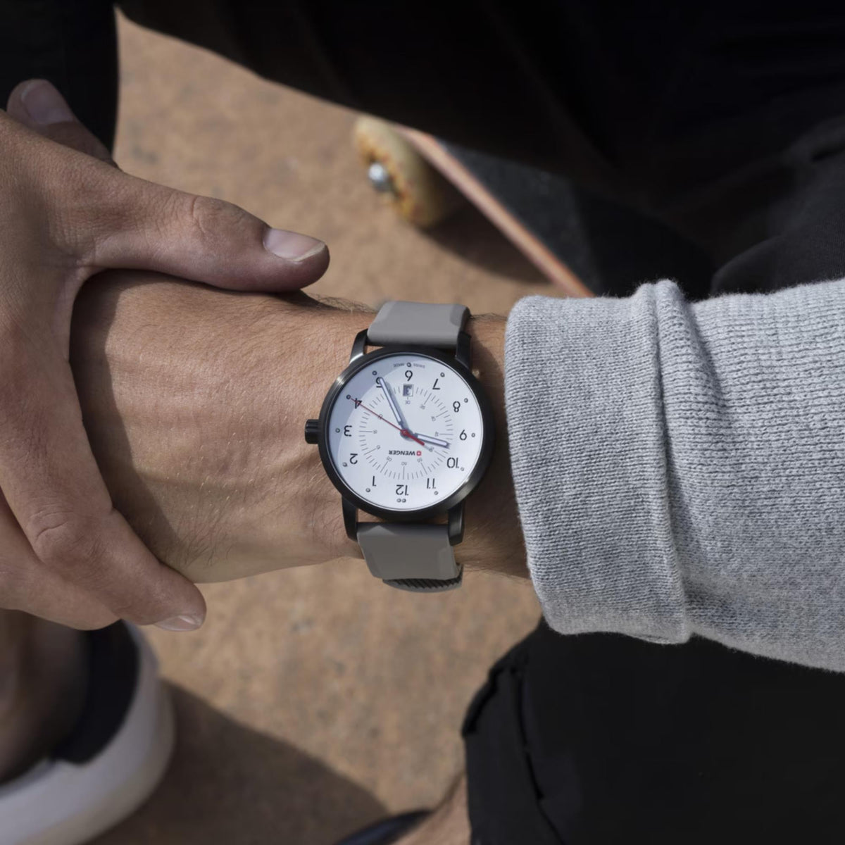 Wenger Avenue 01.1641.121 close-up lifestyle view of white dial watch with black case on wrist