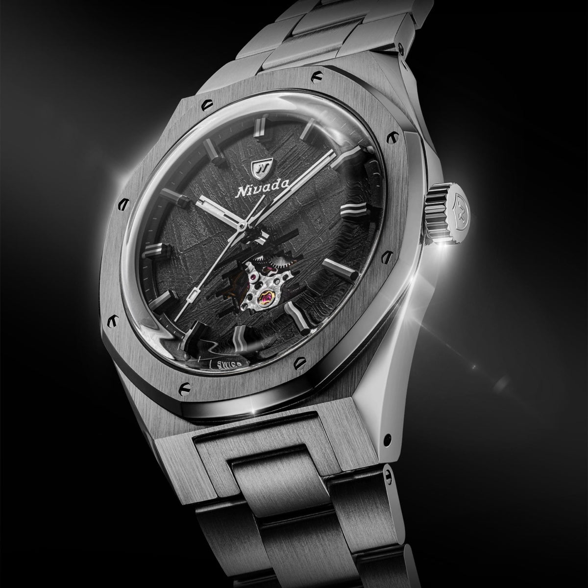 Nivada Grenchen F77 MK2 68052A77 angled profile displaying titanium case finish, octagonal bezel screws, and knurled crown