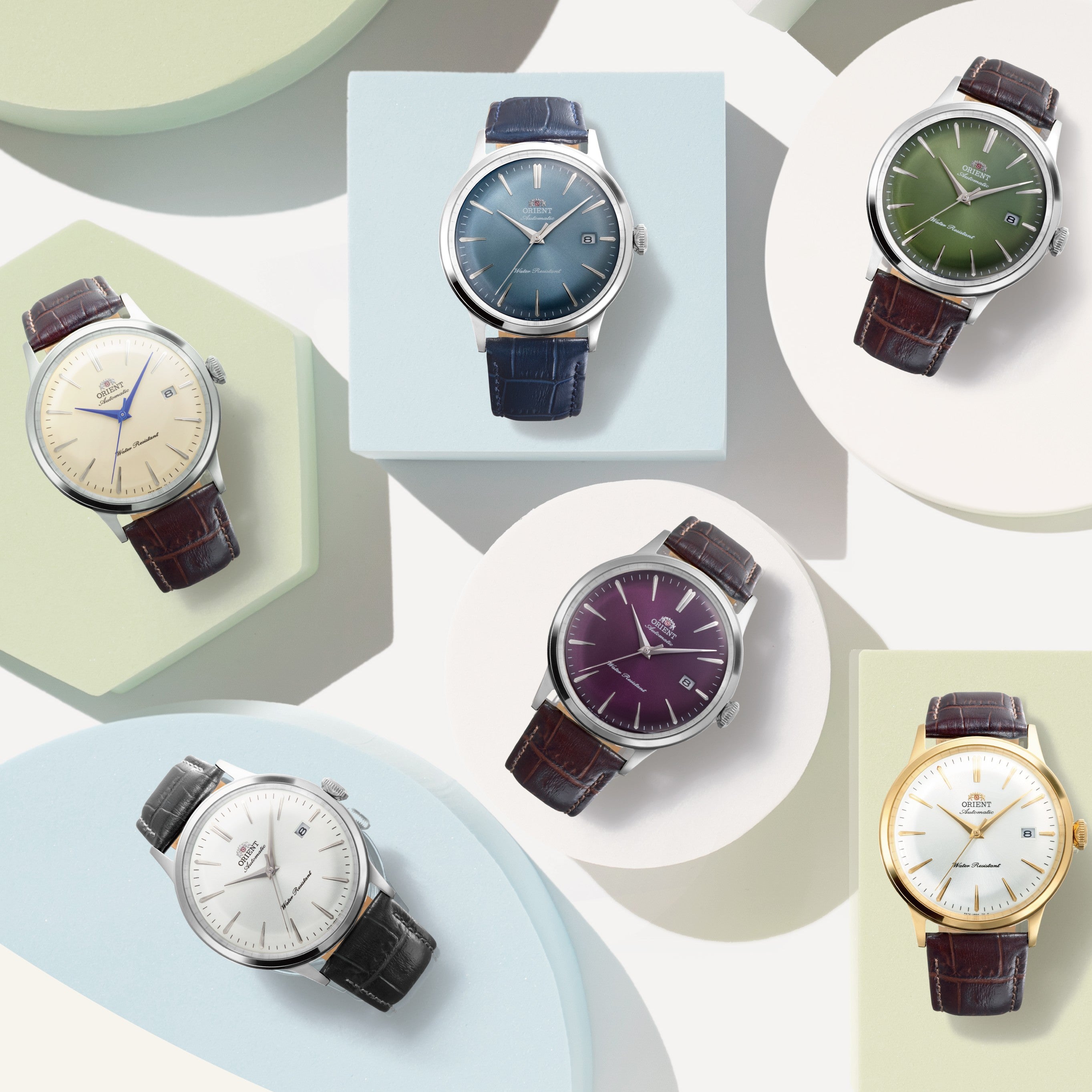 Collection of Orient automatic dress watches in various dial colors and case finishes