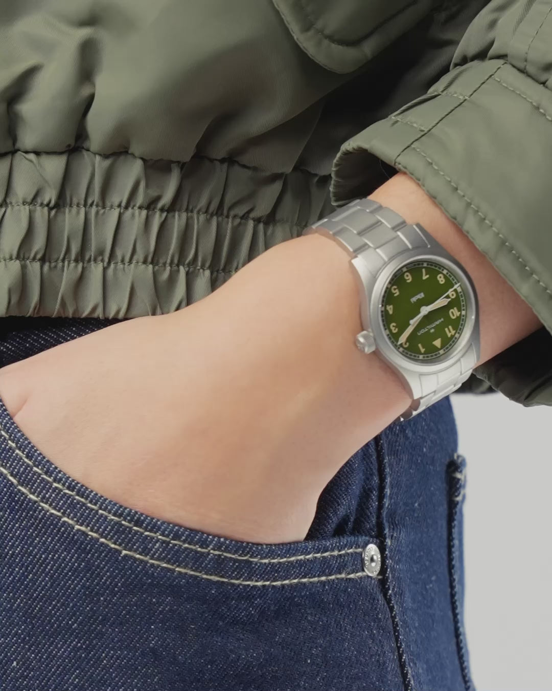 Hamilton Khaki Field 33mm green dial ladies quartz watch worn on wrist
