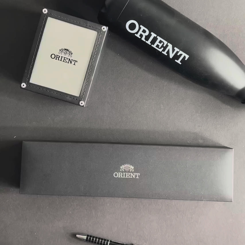 Unboxing an Orient Bambino 40.5mm automatic watch and showcasing its design 