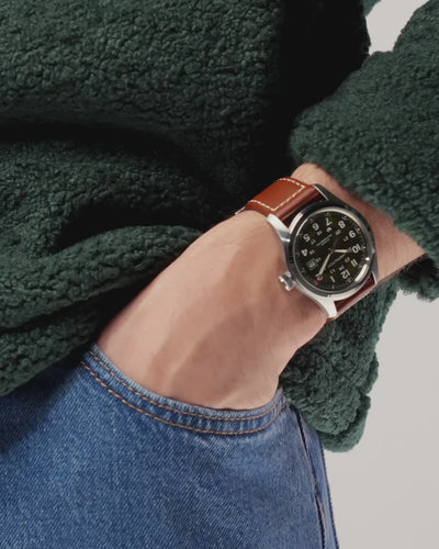 Hamilton Khaki Field Green Dial Leather watch worn on wrist H70605560