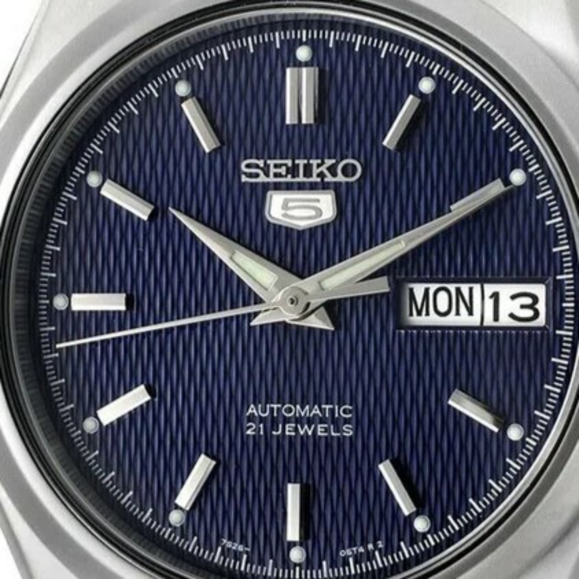 Seiko 5 SNK603K1 blue dial and luminous hands front view