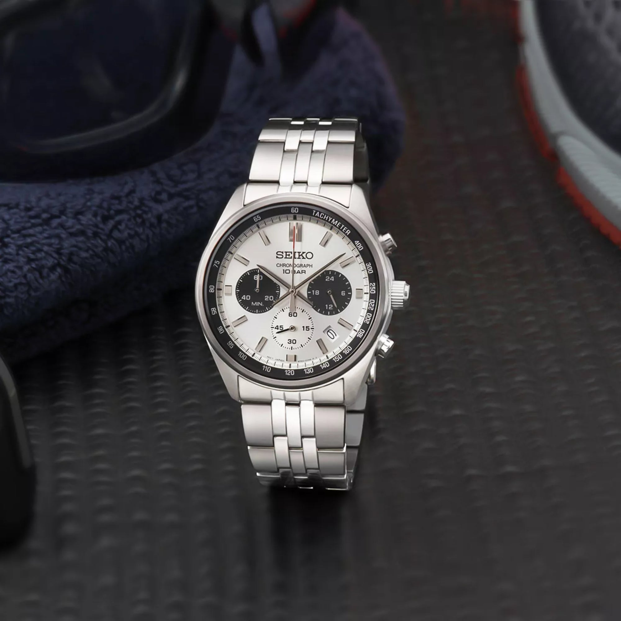 Seiko SSB425P1 chronograph watch placed on dark surface 