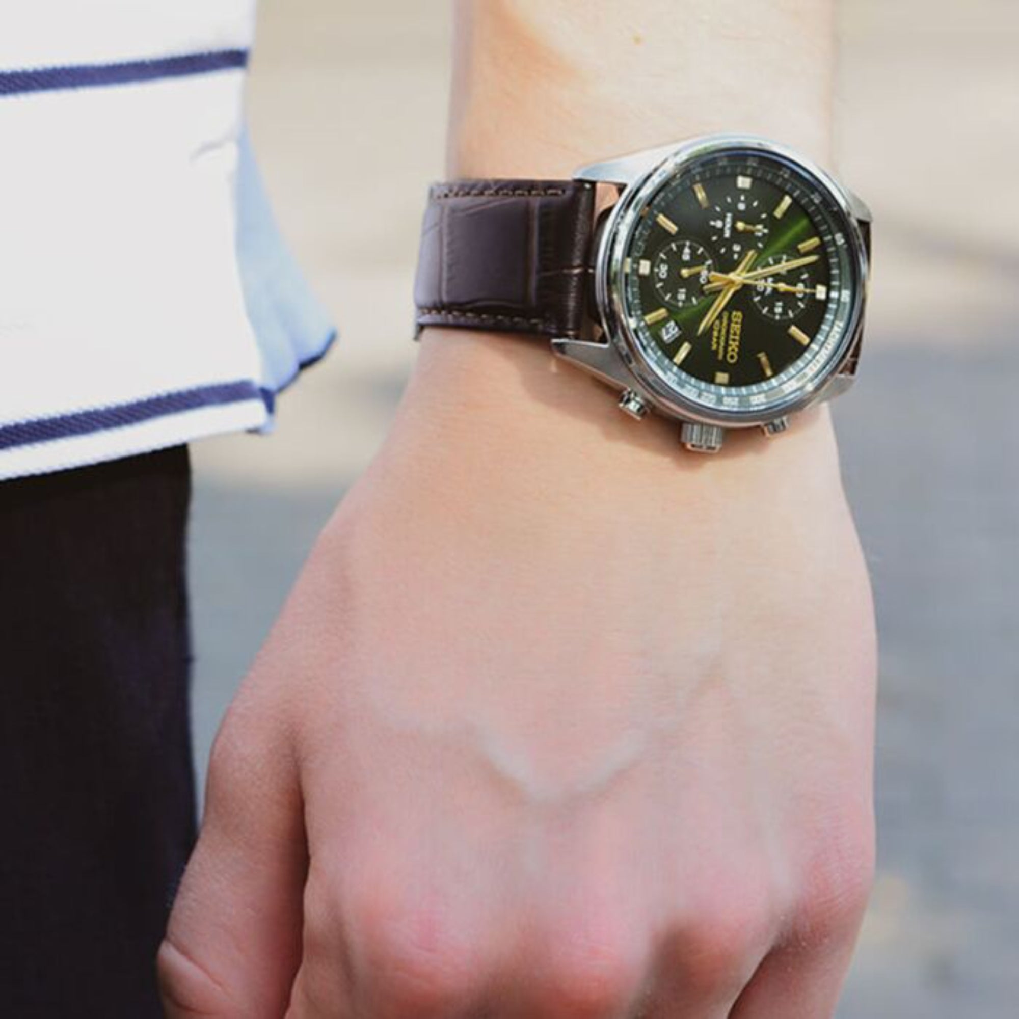 Seiko SSB385P1 green dial chronograph watch on wrist